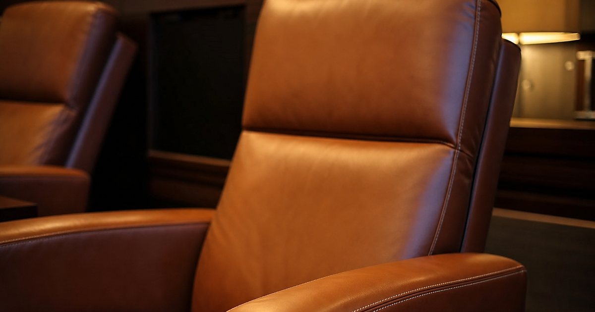 What upholstery materials hold up best in a high-end private screening room over time?